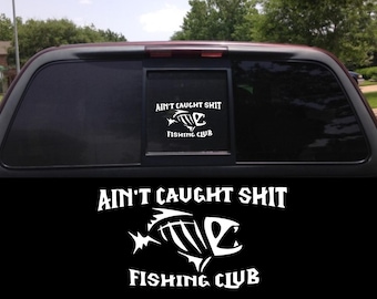 Ain't caught shit fishing club vinyl decal sticker. Car window, laptop, took box, mirror. great gift idea.
