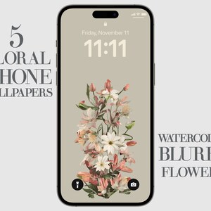 May include: A digital phone screen with a floral wallpaper. The wallpaper features a bouquet of pink and white flowers with a blurred watercolour effect. The time on the phone screen is 11:11. The text "WATERCOLOR BLURRY FLOWERS" is displayed on the screen.