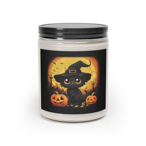 May include: A Halloween-themed candle in a white jar with a black lid. The label features a cartoon black cat wearing a witch hat, sitting between two carved pumpkins, with a full moon in the background.