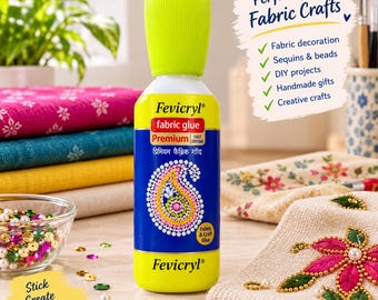 May include: A bottle of Fevicryl Premium fabric glue with a bright lime green cap and a blue label featuring a decorative paisley design. The label includes the text Fevicryl, fabric glue, Premium, and fast drying, along with Hindi script.