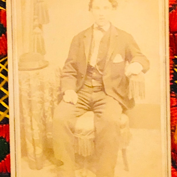 CDV of a gaunt young man in a three-piece suit by Kidmark of Port Chester ca 1860s