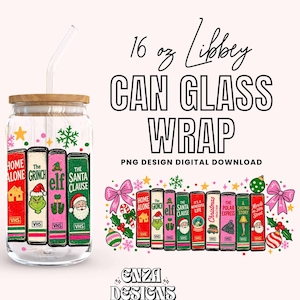 May include: A 16 oz clear glass can with a bamboo lid and glass straw, featuring a colorful wrap design of stacked VHS tapes titled Home Alone, The Grinch, Elf, and The Santa Clause, accented with festive snowflakes, stars, and pink bows.