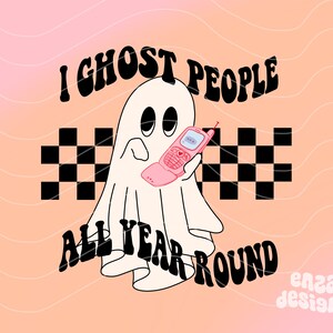 May include: A cartoon ghost holding a pink flip phone with the text "I Ghost People All Year Round" on a peach and pink gradient background. The ghost is white with black eyes and a black and white checkered pattern.