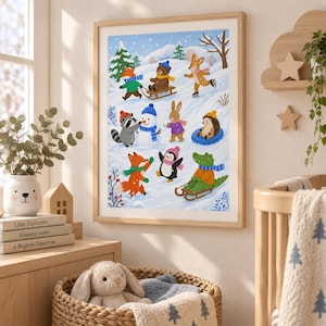 May include: A framed wall art print featuring a snowy winter scene with illustrated animals including a fox, bear, deer, raccoon, rabbit, hedgehog, penguin, and crocodile playing in the snow, building a snowman, and using a wooden sled.