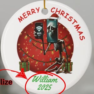 May include: A white ceramic Christmas ornament with a humorous design. The ornament features a skeleton with a smartphone head, holding another phone displaying a WiFi signal. The words "Merry Christmas" are printed around the edge. The name "William" and the year "2025" are printed at the bottom.