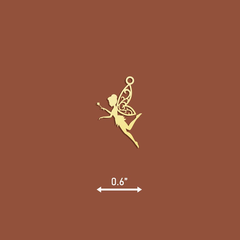 May include: Gold-colored metal charm featuring a fairy silhouette with wings and a wand. The charm is 0.6 inches in size.