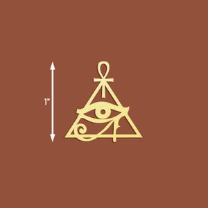 May include: A gold-colored metal pendant featuring an all-seeing eye inside a triangle with an ankh symbol at the top. The pendant is 1 inch in size.