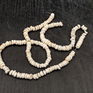 White Puka Seashells Strand (1 strand approx. 16 inches x 4-5+ mm) Beautiful Puka Shells for arts crafts jewelry & decoration!