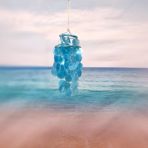 Turquoise Capiz Shell Wind Chime Chandelier (1 Chime approx. 10 x 5 inches) Turquoise Capiz Shell Wind Chime for beachside home charm!