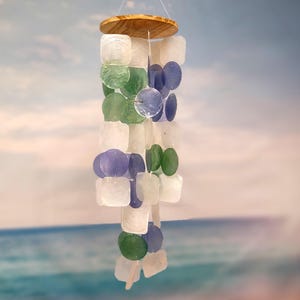 Blue Green White Capiz Shell Wind Chime (1 chime approx. 18 x 5 inches) Blue Green White Capiz Shell Wind Chime for coastal home decoration!