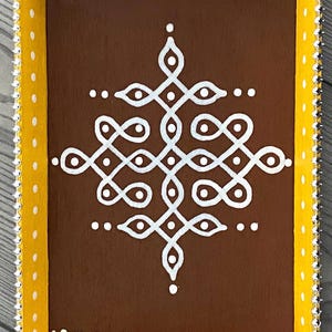 May include: A brown wooden tray with a yellow border and white decorative design. The tray has a beaded trim around the edge.