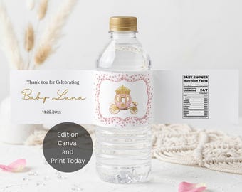 May include: A clear plastic water bottle with a white label featuring a pink carriage illustration, gold text reading Thank You for Celebrating Baby Luna, the date 11.22.20xx, and a Baby Shower Nutrition Facts chart. A dark circle says Edit on Canva.