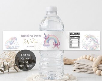 May include: A clear plastic water bottle with a white label featuring a pastel unicorn, a rainbow, and a bow. The text reads Jennifer & Dave's Baby Shower 11.5.20XX, along with a Baby Shower Nutrition Facts chart and a circular Edit on Canva and Print Today badge.