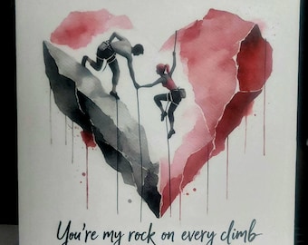 May include: Watercolor painting of two figures rock climbing, with a red heart shape in the background. The text "You're my rock on every climb" is written below the figures.