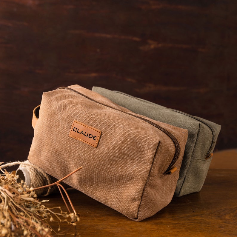 a couple of bags sitting on top of a wooden table