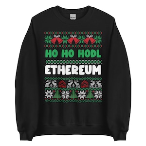 May include: Black Christmas jumper with a green and white snowflake pattern. The jumper has the text "Ho Ho Hodl Ethereum" in white.