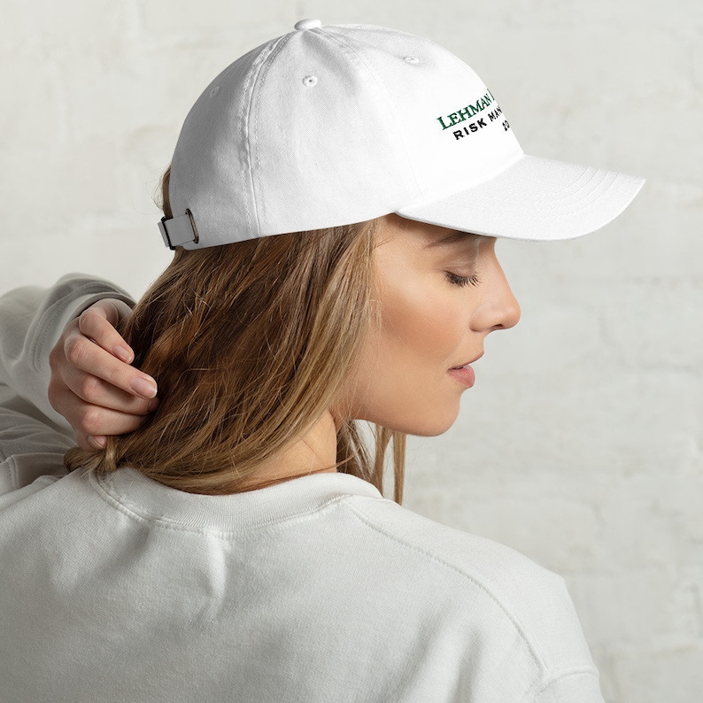 An ode to financial history, this hat is more than an accessory – it's a conversation piece. Embrace the intrigue and order your "Lehman Brothers Risk Management 2008" hat today!