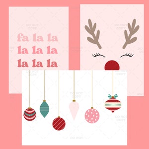 May include: A set of three printable Christmas cards featuring a pink background with white text and illustrations. The first card says "fa la la la la la" in a pink retro font. The second card features a cartoon reindeer with closed eyes and a red nose. The third card features five hanging Christmas ornaments in red, pink, and green.