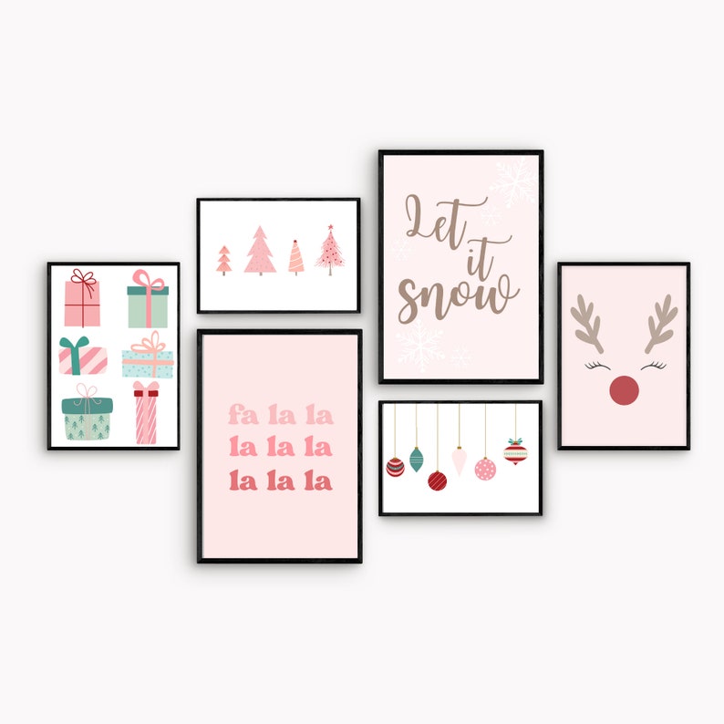 May include: A set of six pink and white Christmas-themed printable wall art prints. The prints feature a reindeer, Christmas trees, ornaments, and the text "Let it snow" and "fa la la la la la la".