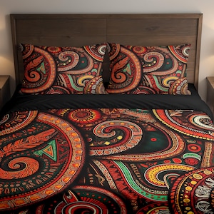 May include: A bed with a dark wooden headboard, featuring a duvet cover and two pillowcases. The bedding has a vibrant, intricate pattern in shades of red, orange, green, and yellow on a black background. The design includes swirling shapes and geometric elements.