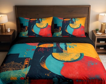 May include: A bed set featuring a duvet cover and two pillowcases with an abstract design. The pattern includes shapes in teal, yellow, red, and navy blue. The bed set is on a wooden bed frame with two nightstands and lamps.