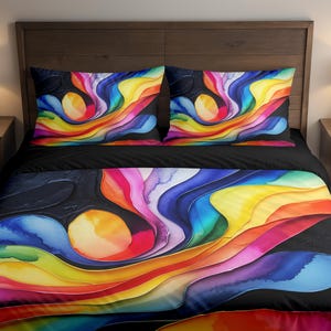May include: A bed set featuring a vibrant, abstract design. The bedding includes a duvet cover and two pillowcases, all with a colorful, flowing pattern in shades of blue, yellow, orange, pink, and purple against a black background. The bedroom has wooden furniture.