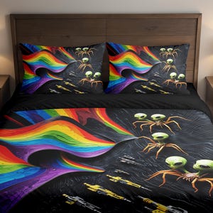 May include: Black bedding set with a vibrant rainbow design and alien creatures. The duvet cover and pillowcases feature a colorful rainbow emanating from a dark background, with green-headed aliens and yellow spacecraft.