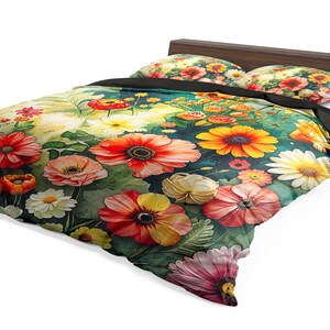 May include: A bed with a floral duvet cover and two matching pillowcases. The bedding features a colorful design of red, yellow, and white flowers on a green background. The bed frame is made of dark wood.