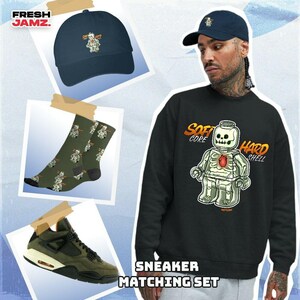 AJ 4 Undefeated Glowing Heart Inside Unisex Shirt, Hoodie, Sweatshirt, Socks, Hat To Match Sneaker