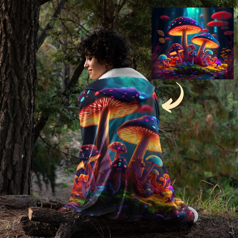 May include: A hooded cloak featuring a vibrant illustration of glowing mushrooms in a forest setting. The cloak's design includes a variety of colorful mushrooms with detailed caps and stems, set against a dark, mystical background. The cloak is worn outdoors.