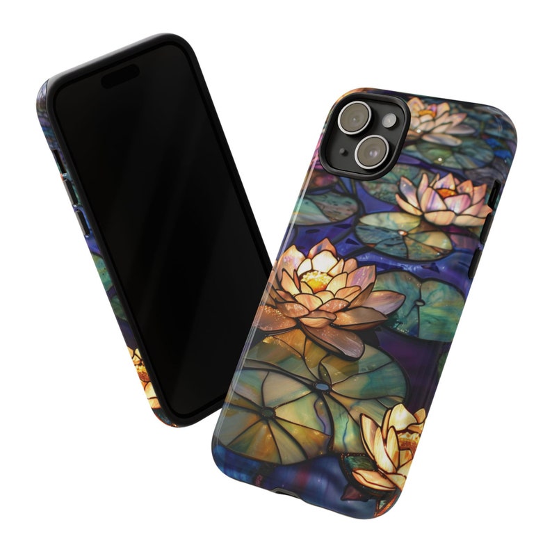 May include: A phone case with a stained glass design of water lilies and lily pads in shades of blue, green, yellow, and purple.