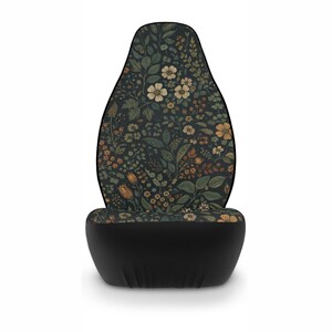 May include: A set of three ceramic mugs with a speckled, cream-colored glaze. Each mug features a different hand-painted floral design in shades of blue, green, and yellow. The mugs have a simple, rounded shape and a comfortable handle.