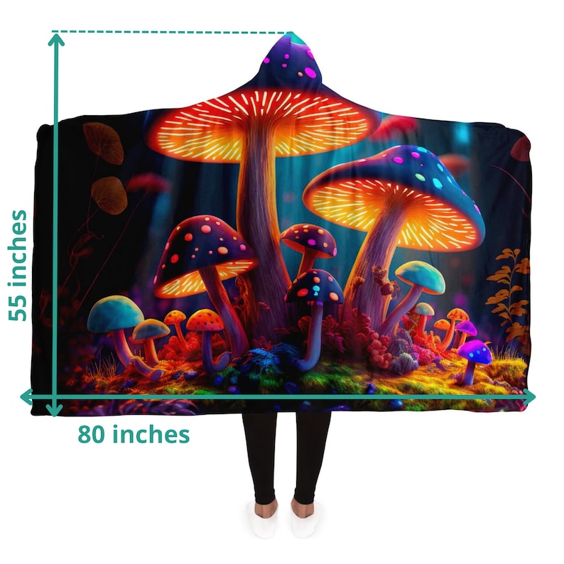 May include: Hooded blanket featuring a vibrant illustration of glowing mushrooms in a forest setting. The blanket measures 55 inches high and 80 inches wide. The design includes orange, blue, purple, and green colors, creating a whimsical and colorful aesthetic.