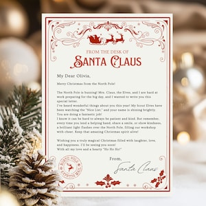 Puede incluir: Una carta de Papá Noel, con un borde rojo decorativo y texto. El membrete dice "From the Desk of Santa Claus". La carta está dirigida a "My Dear Olivia" e incluye un mensaje navideño. El sello North Pole Express Mail es visible.