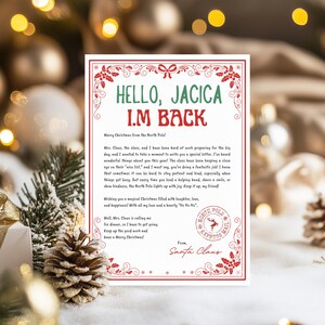 May include: A Christmas-themed letter with the text "HELLO, JACICA I.M BACK" in green. The letter is decorated with red floral accents and a North Pole Express Mail stamp. The letter is from Santa Claus.