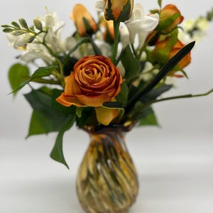 Amber Vase Floral Arrangement | Orange Princess Roses, White Freesia
