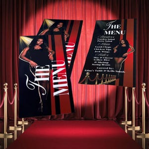 May include: Three menu boards with the text "THE MENU" in white script and a list of food items. The boards have a black and red striped design and feature a woman in a black dress. The scene is set on a red carpet.