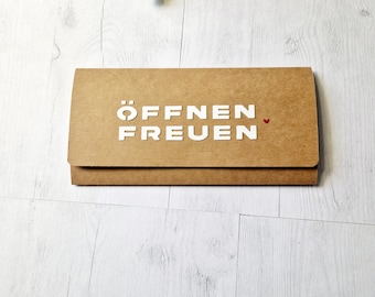Packaging for money, gift certificate, opening, delight
