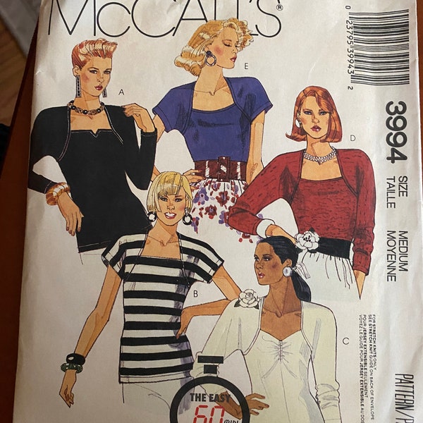 Vintage McCalls Easy 3994 Misses Tops for Stretch Knit Only. Size Medium. Variations in sleeves, neckline, seam details and hem. NEVER CUT.