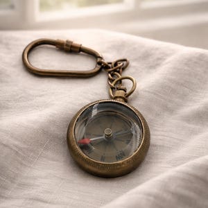 May include: A set of three ceramic mugs with a speckled, matte finish. The mugs are in shades of cream, light gray, and dark gray. Each mug has a simple, minimalist design, perfect for coffee or tea.