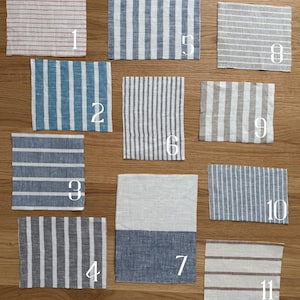 May include: Eleven fabric swatches with different striped patterns. The swatches are numbered 1 through 11. The swatches are arranged in three rows. The top row has three swatches, the middle row has three swatches, and the bottom row has five swatches.