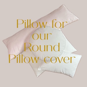 May include: Three white pillows, one round and two rectangular, with the text "Pillow for our Round Pillow Cover" in gold lettering.