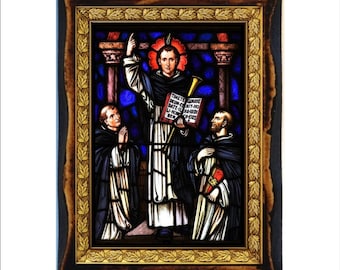 May include: A stained glass window depicting a scene of three men in religious garb. The central figure is holding a book and a trumpet, while the other two figures are standing on either side of him. The window is framed in a dark wood frame with a gold leaf border.