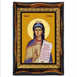 May include: A framed icon of Saint Esther, a woman with dark hair and a crown, holding a scroll with text. The background is a yellow halo with a gold frame.