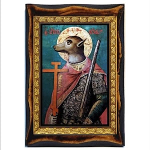 May include: A framed icon painting of a dog wearing armor and holding a sword and a cross. The dog is depicted as a saint with a halo. The painting is on a wooden background with a gold frame.