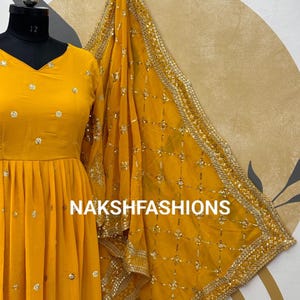 Yellow Gown & Pant Set with Sequence Embroidery and Lace Border Dupatta main image 1