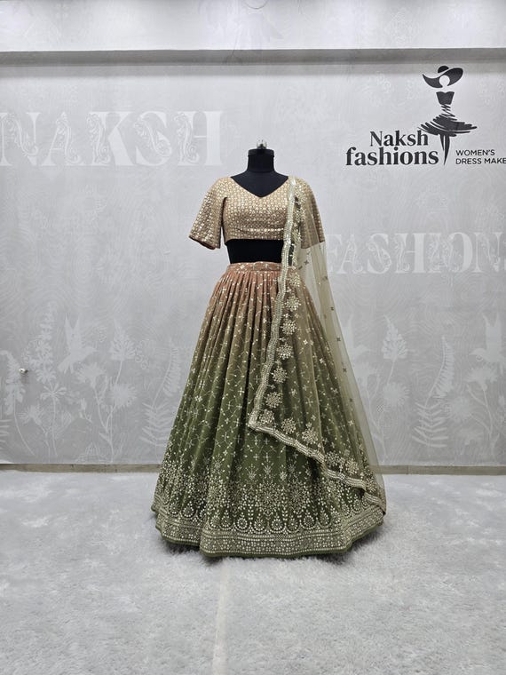 light green mehndi dress Diane von Furstenberg Black / Green Floral Long Sleeve Wrap Midi Dress –  Reliked main image 1