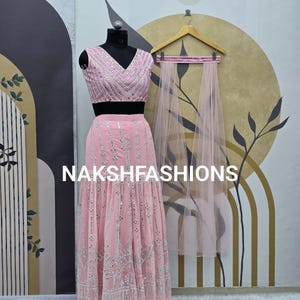 Pink Georgette Sharara Suit: Embroidered Top, Palazzo & Net Dupatta