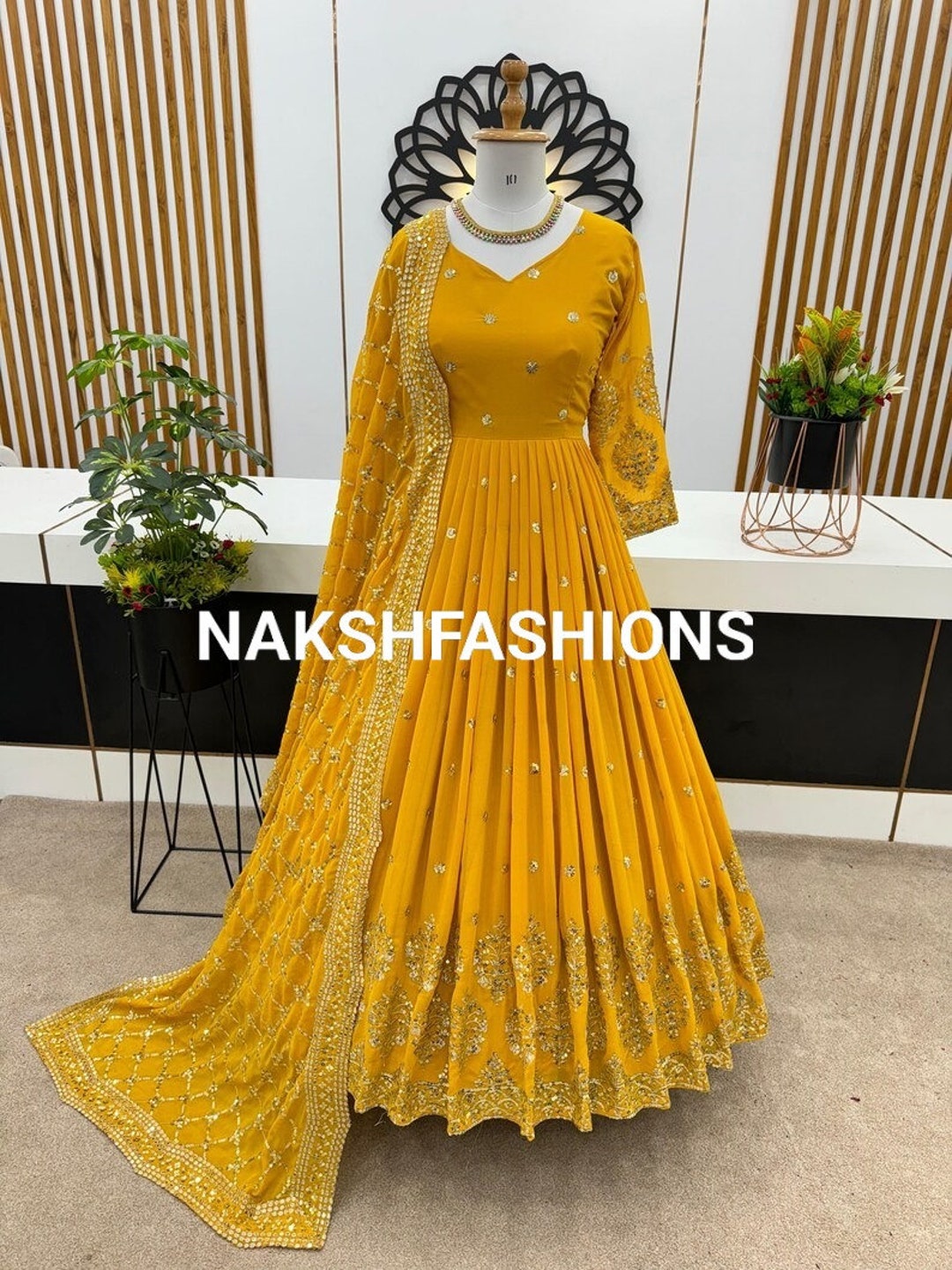 New Faux Georgette Embroidery Work Yellow Kurti Set For Women
