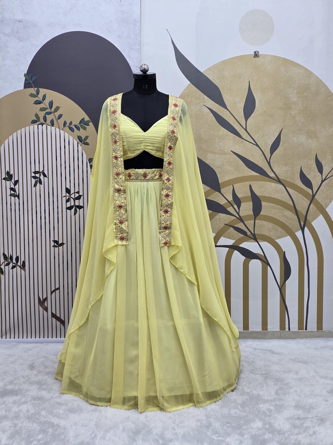 Blooming Georgette Yellow Embroidered Festive Lehenga Choli